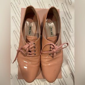 Miu Miu pink patent leather oxford shoe with crystal heel